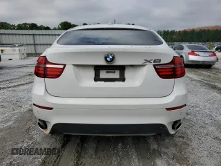 2014 BMW X6 xDrive35i z VIN 5UXFG2C5XE0C43042, wystawiony jako Copart lot #56151565 z przebiegiem Nie podano mil oraz Tytuł czysty. Historia ofert i sprzedaży dostępna na DreamBid. Obrazek 6.