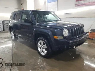 2014 Jeep Patriot Latitude with VIN 1C4NJRFB0ED588336, listed as a Copart auction lot 89391695 with 133,941 mi miles and Salvage Title. Bid and sale history available at carsss.com. Image 4.