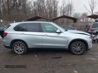 2016 BMW X5 xDrive50i with VIN 5UXKR6C53G0J83329, listed as a IAAI auction lot 41150598 with 81,136 mi miles. Bid and sale history available at carsss.com. Image 13.