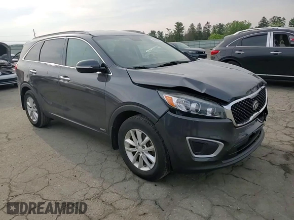 2017 Kia Sorento LX z VIN 5XYPGDA33HG333664, wystawiony jako Copart lot #59619905 z przebiegiem 76 439 mil mil oraz Szkoda całkowita • Salvage title. Historia ofert i sprzedaży dostępna na DreamBid. Obrazek 14.