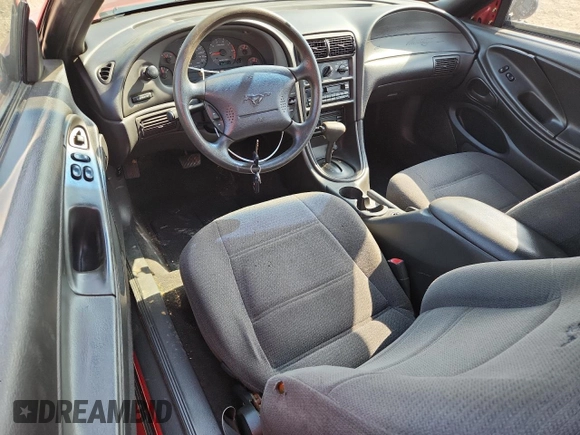1999 Ford Mustang z VIN 1FAFP4043XF155493, wystawiony jako Copart lot #62666095 z przebiegiem 126 807 mil mil oraz Nie do naprawy • Non repairable. Historia ofert i sprzedaży dostępna na DreamBid. Obrazek 8.