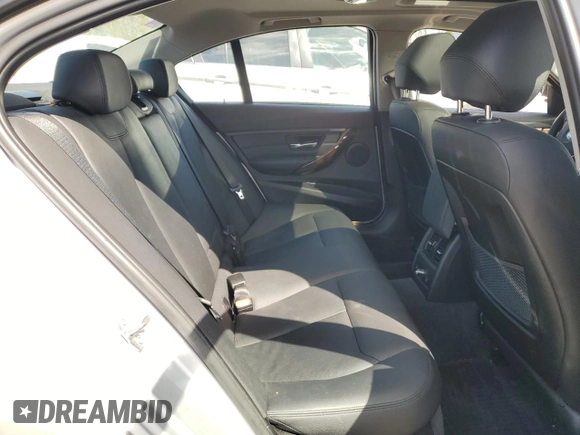 2014 BMW 3 Series 335i xDrive with VIN WBA3B9C56EP458673, listed as a Copart auction lot 52934245 with 37,852 mi miles and Salvage title. Bid and sale history available at DreamBid. Image 10.