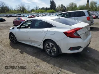 2016 Honda Civic EX-L with VIN 19XFC1F79GE204714, listed as a Copart auction lot 53377405 with 122,309 mi miles and Salvage title. Bid and sale history available at DreamBid. Image 2.