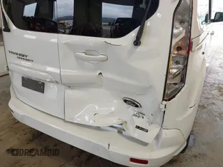 2015 Ford Transit Connect XLT z VIN NM0GS9F71F1194474, wystawiony jako IAAI lot #41666625 z przebiegiem 111 224 mil mil oraz . Historia ofert i sprzedaży dostępna na DreamBid. Obrazek 6.