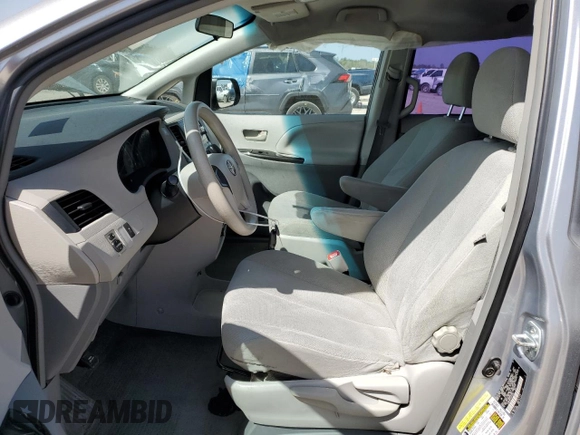 2012 Toyota Sienna with VIN 5TDKA3DC1CS012509, listed as a Copart auction lot 49906955 with 141,745 mi miles and Salvage Title. Bid and sale history available at DreamBid. Image 7.