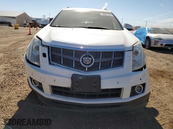 2012 Cadillac SRX Premium Collection с VIN 3GYFNFE30CS534835, выставлен на аукционе Copart как лот 63681235 с пробегом 124 964 миль миль и Списание • Salvage title. История ставок и продаж доступна на DreamBid. Изображение 5.