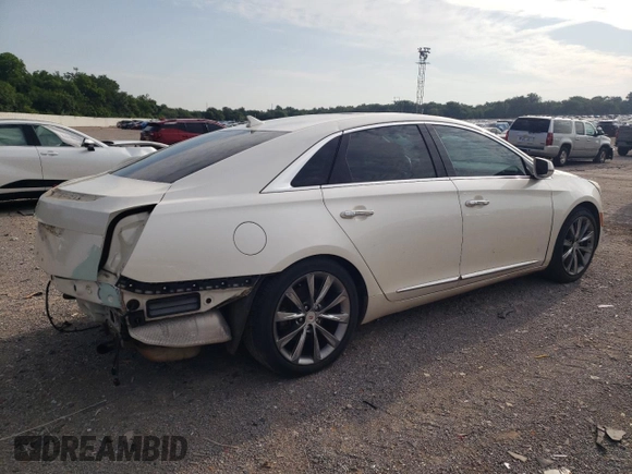 2013 Cadillac XTS Luxury with VIN 2G61P5S37D9186395, listed as a Copart auction lot 56859015 with 132,458 mi miles and Salvage title. Bid and sale history available at DreamBid. Image 3.