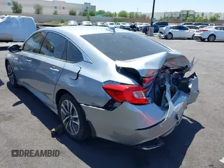 2020 Honda Accord with VIN 1HGCV3F11LA002534, listed as a IAAI auction lot 42537701 with 115,166 mi miles and . Bid and sale history available at DreamBid. Image 3.