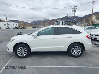 2018 Acura RDX with VIN 5J8TB3H31JL012439, listed as a IAAI auction lot 41565530 with 63,909 mi miles and . Bid and sale history available at DreamBid. Image 14.