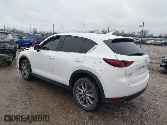 2021 Mazda CX-5 Grand Touring with VIN JM3KFADM4M1340141, listed as a IAAI auction lot 41194711 with 37,887 mi miles. Bid and sale history available at carsss.com. Image 3.