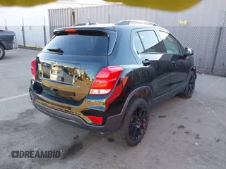 2021 Chevrolet Trax LT with VIN KL7CJPSB9MB342992, listed as a IAAI auction lot 41667044 with 52,289 mi miles. Bid and sale history available at carsss.com. Image 4.