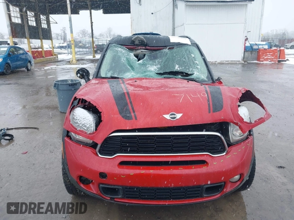 2014 MINI Countryman S z VIN WMWZC5C57EWM17149, wystawiony jako IAAI lot #41246831 z przebiegiem 112 369 mil mil oraz . Historia ofert i sprzedaży dostępna na DreamBid. Obrazek 6.