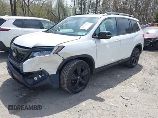 2021 Honda Passport Elite z VIN 5FNYF8H08MB014739, wystawiony jako IAAI lot #42137913 z przebiegiem 50 580 mil mil oraz . Historia ofert i sprzedaży dostępna na DreamBid. Obrazek 2.