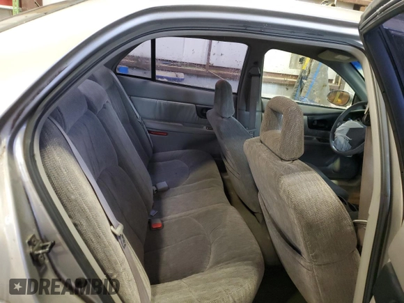 1999 Buick Regal LS with VIN 2G4WB52K3X1470162, listed as a Copart auction lot 79957944 with 153,249 mi miles and Salvage Title. Bid and sale history available at carsss.com. Image 10.