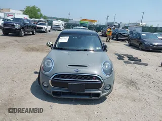 2019 MINI Hardtop 4 Door Cooper S with VIN WMWXU3C57K2H54547, listed as a IAAI auction lot 42492037 with 74,657 mi miles and . Bid and sale history available at DreamBid. Image 13.