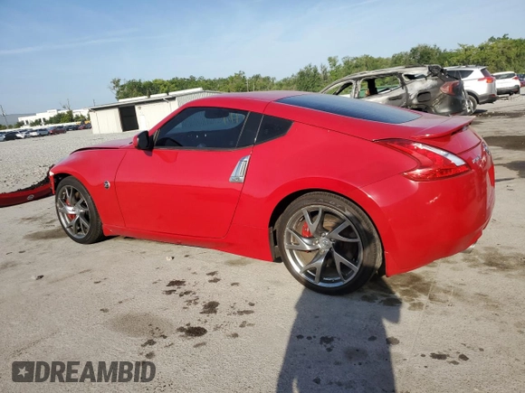 2014 Nissan 370Z with VIN JN1AZ4EHXEM631132, listed as a Copart auction lot 53753545 with 19,276 mi miles and Salvage Title. Bid and sale history available at carsss.com. Image 2.