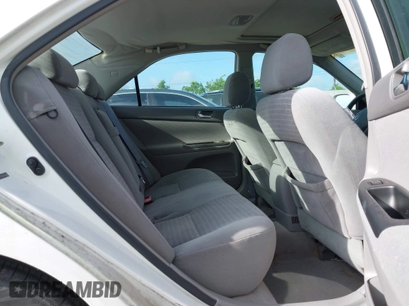 2005 Toyota Camry LE z VIN 4T1BE30K65U568049, wystawiony jako IAAI lot #42453538 z przebiegiem 182 375 mil mil oraz . Historia ofert i sprzedaży dostępna na DreamBid. Obrazek 8.