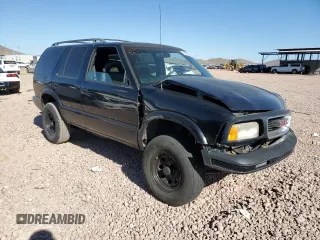1997 GMC Jimmy SLS with VIN 1GKDT13W8V2560329, listed as a Copart auction lot 80992204 with 231,051 mi miles and Salvage Title. Bid and sale history available at carsss.com. Image 4.