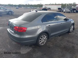 2014 Volkswagen Jetta SE with VIN 3VWD07AJ9EM277085, listed as a IAAI auction lot 42531957 with 171,613 mi miles and . Bid and sale history available at DreamBid. Image 4.