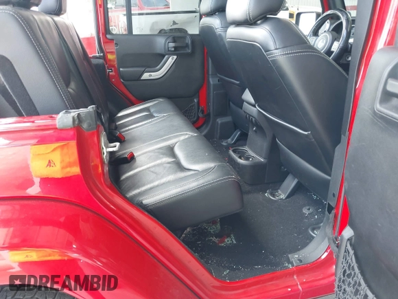 2014 Jeep Wrangler Unlimited Sahara z VIN 1C4BJWEGXEL179054, wystawiony jako IAAI lot #42151597 z przebiegiem 151 810 mil mil oraz . Historia ofert i sprzedaży dostępna na DreamBid. Obrazek 8.