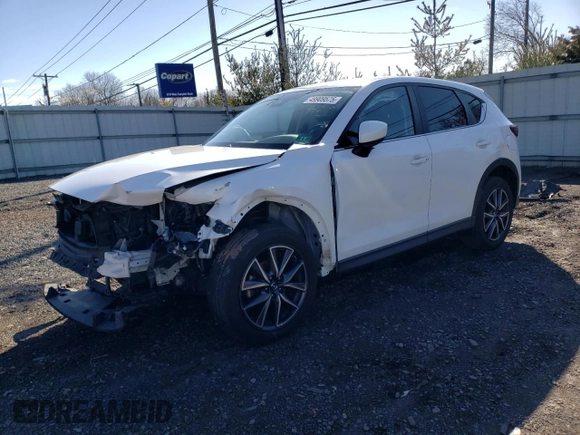2018 Mazda CX-5 Touring with VIN JM3KFBCM3J0437422, listed as a Copart auction lot 49909575 with 0 mi miles and Salvage Title. Bid and sale history available at carsss.com. Image 1.