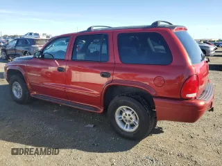 2001 Dodge Durango z VIN 1B4HS28Z61F579891, wystawiony jako Copart lot #80510284 z przebiegiem 186 180 mil mil oraz Czysty tytuł • Clean title. Historia ofert i sprzedaży dostępna na DreamBid. Obrazek 2.