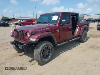 2021 Jeep Gladiator Sport S with VIN 1C6HJTAG8ML542343, listed as a IAAI auction lot 42317089 with 56,354 mi miles and . Bid and sale history available at DreamBid. Image 2.