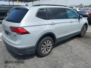 2018 Volkswagen Tiguan SEL with VIN 3VV2B7AX8JM105246, listed as a IAAI auction lot 41906838 with 110,749 mi miles and . Bid and sale history available at DreamBid. Image 4.