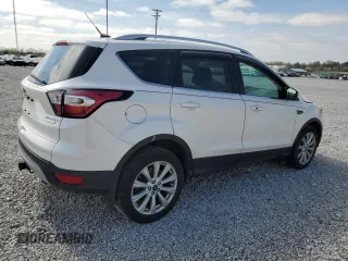 2017 Ford Escape Titanium with VIN 1FMCU0J92HUD75757, listed as a Copart auction lot 51003895 with 119,143 mi miles and Salvage Title. Bid and sale history available at DreamBid. Image 3.