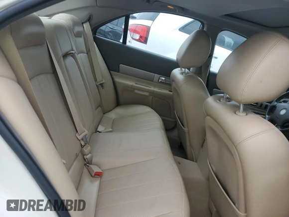 2005 Lincoln LS Sport z VIN 1LNHM87A05Y667868, wystawiony jako Copart lot #73318074 z przebiegiem 114 623 mil mil oraz Szkoda całkowita • Salvage title. Historia ofert i sprzedaży dostępna na DreamBid. Obrazek 10.
