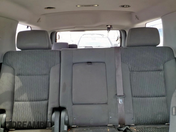 2015 Chevrolet Tahoe LS z VIN 1GNSCAKC4FR113247, wystawiony jako Copart lot #55578085 z przebiegiem 194 023 mil mil oraz Szkoda całkowita • Salvage title. Historia ofert i sprzedaży dostępna na DreamBid. Obrazek 10.