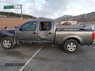2007 Nissan Frontier SE z VIN 1N6AD09U67C411083, wystawiony jako IAAI lot #41691251 z przebiegiem 186 495 mil mil oraz . Historia ofert i sprzedaży dostępna na DreamBid. Obrazek 14.