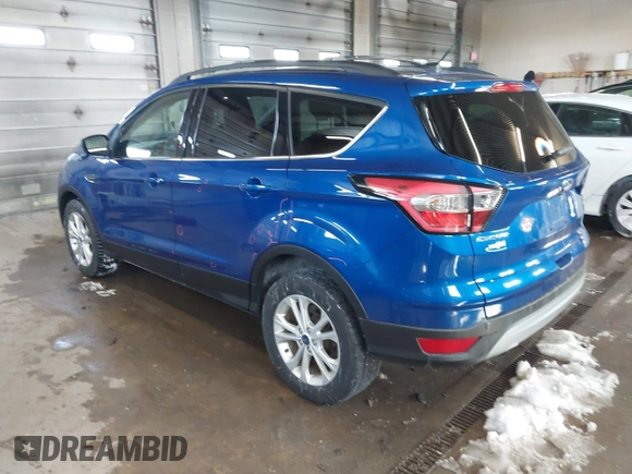 2018 Ford Escape SE z VIN 1FMCU9GD1JUB80500, wystawiony jako IAAI lot #41613294 z przebiegiem 112 187 mil mil oraz . Historia ofert i sprzedaży dostępna na DreamBid. Obrazek 3.