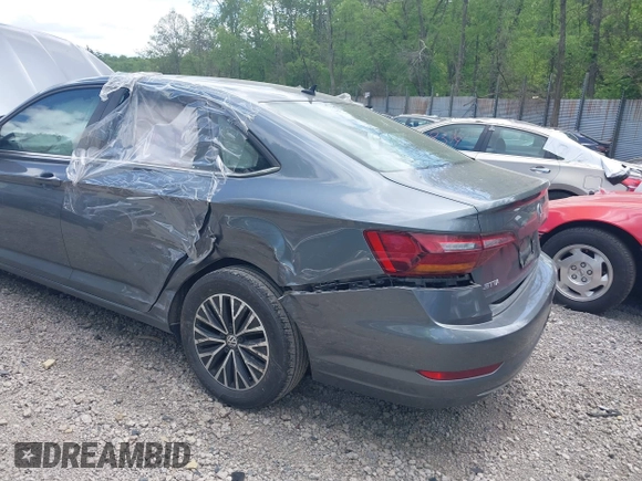2019 Volkswagen Jetta S z VIN 3VWC57BUXKM121316, wystawiony jako IAAI lot #42290107 z przebiegiem 117 371 mil mil oraz . Historia ofert i sprzedaży dostępna na DreamBid. Obrazek 12.