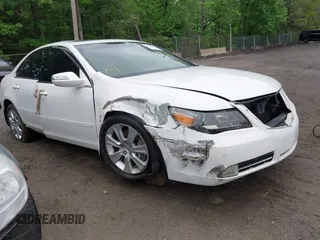 2009 Acura RL Technology z VIN JH4KB26649C002399, wystawiony jako IAAI lot #42136396 z przebiegiem 75 922 mil mil oraz . Historia ofert i sprzedaży dostępna na DreamBid. Obrazek 1.