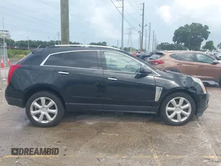 2015 Cadillac SRX Premium Collection with VIN 3GYFNGE30FS634363, listed as a IAAI auction lot 42672064 with 146,821 mi miles and . Bid and sale history available at DreamBid. Image 13.