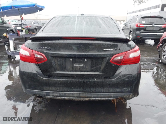 2018 Nissan Altima 2.5 SL with VIN 1N4AL3AP4JC288183, listed as a IAAI auction lot 41466582 with 100,858 mi miles. Bid and sale history available at carsss.com. Image 16.
