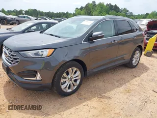 2020 Ford Edge Titanium z VIN 2FMPK4K98LBA76737, wystawiony jako IAAI lot #41981689 z przebiegiem 93 501 mil mil oraz . Historia ofert i sprzedaży dostępna na DreamBid. Obrazek 2.