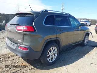2014 Jeep Cherokee Latitude with VIN 1C4PJMCS5EW201462, listed as a IAAI auction lot 41727379 with 170,958 mi miles and . Bid and sale history available at DreamBid. Image 4.