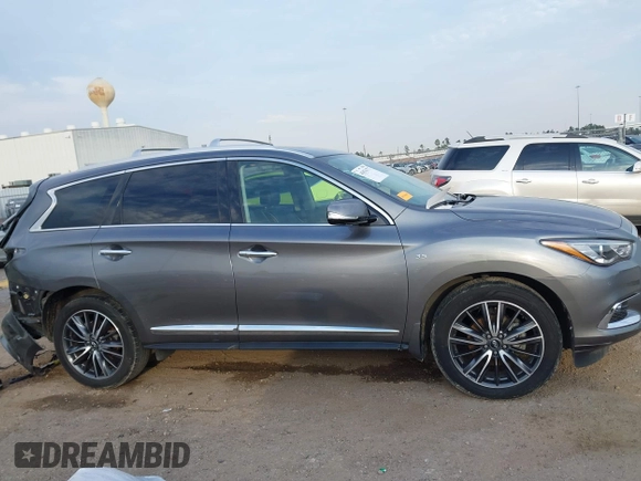 2020 Infiniti QX60 Luxe with VIN 5N1DL0MN5LC513550, listed as a IAAI auction lot 41676777 with 78,534 mi miles and . Bid and sale history available at DreamBid. Image 14.