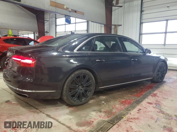 2015 Audi A8 L 4.0T with VIN WAU32AFD3FN036507, listed as a Copart auction lot 82298094 with 77,156 mi miles and Salvage Title. Bid and sale history available at carsss.com. Image 3.