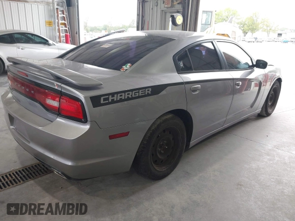 2013 Dodge Charger SE with VIN 2C3CDXBG7DH601545, listed as a IAAI auction lot 40332328 with 162,992 mi miles. Bid and sale history available at carsss.com. Image 4.