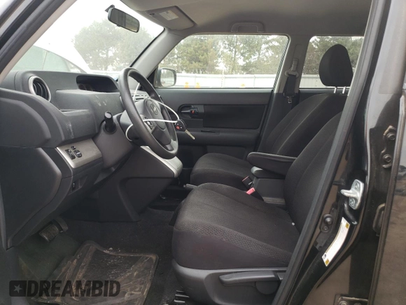 2009 Scion xB with VIN JTLKE50E491063990, listed as a Copart auction lot 53448265 with 152,420 mi miles and Salvage Title. Bid and sale history available at DreamBid. Image 7.