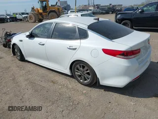2016 Kia Optima LX Turbo with VIN 5XXGT4L10GG037107, listed as a IAAI auction lot 42071593 with 152,919 mi miles. Bid and sale history available at carsss.com. Image 3.
