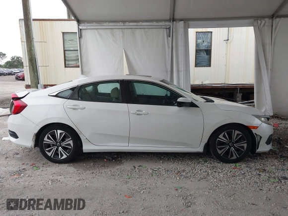 2017 Honda Civic EX-L z VIN 19XFC1F78HE025582, wystawiony jako IAAI lot #42432134 z przebiegiem 144 688 mil mil oraz . Historia ofert i sprzedaży dostępna na DreamBid. Obrazek 13.