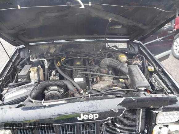 2000 Jeep Cherokee with VIN 1J4FF48S4YL145195, listed as a IAAI auction lot 42302654 with 173,764 mi miles and . Bid and sale history available at DreamBid. Image 10.