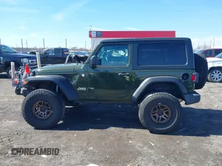 2021 Jeep Wrangler 80th Anniversary with VIN 1C4HJXAG4MW647038, listed as a IAAI auction lot 41580575 with 19,051 mi miles and . Bid and sale history available at DreamBid. Image 14.