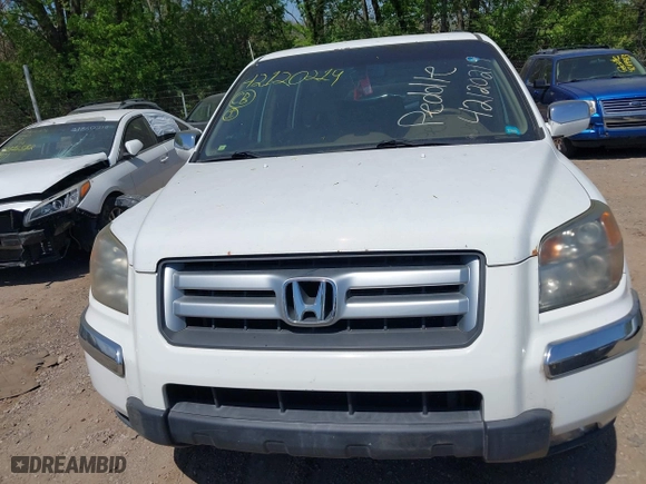 2007 Honda Pilot EX-L with VIN 5FNYF18567B032406, listed as a IAAI auction lot 42120219 with 205,687 mi miles. Bid and sale history available at carsss.com. Image 6.
