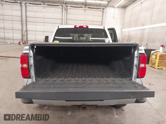 2017 Chevrolet Silverado 1500 LT with VIN 3GCUKREC5HG318772, listed as a IAAI auction lot 42056116 with 82,987 mi miles and . Bid and sale history available at DreamBid. Image 17.