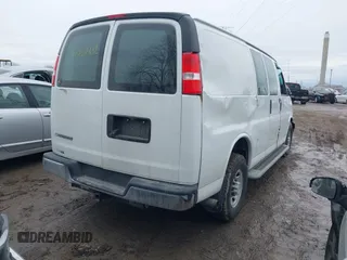2018 Chevrolet Express Cargo Van with VIN 1GCWGAFG0J1904474, listed as a IAAI auction lot 41467432 with 54,996 mi miles. Bid and sale history available at carsss.com. Image 4.